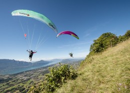 Chambery France (73), August 28, 2014: training above Lake du Bourget for the french paragliding aerobatic championship