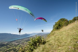 Chambery France (73), August 28, 2014: training above Lake du Bourget for the french paragliding aerobatic championship