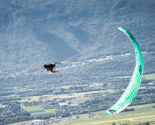Chambery France (73), August 28, 2014: training above Lake du Bourget for the french paragliding aerobatic championship
