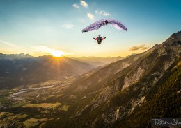 © www.TristanShu.com High up in the air, the Alps, a sunset and a full stall glider with Jean Baptiste Chandelier